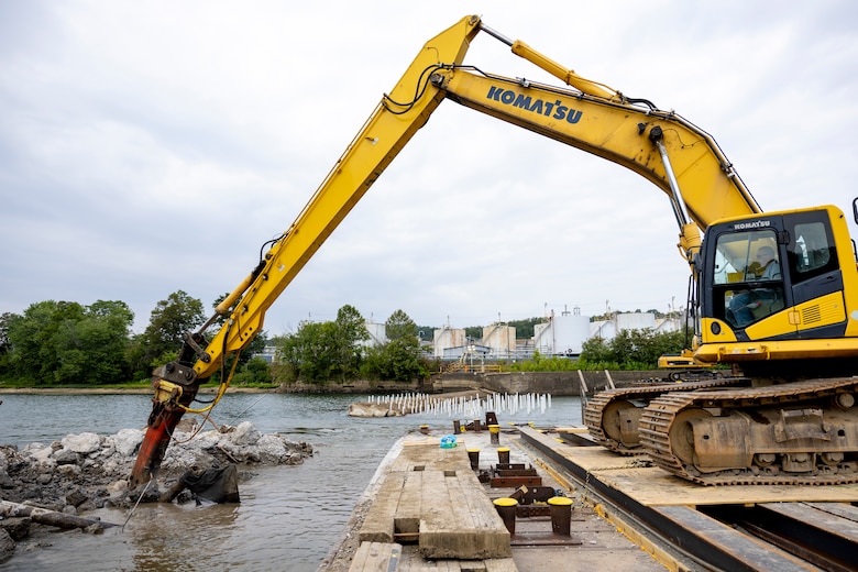 Contractors for the U.S. Army Corps of Engineers Pittsburgh District use various floating barges to drill, demolish and remove the fixed-crest dam at the Monongahela River Locks and Dam 3 in Elizabeth, Pennsylvania, July 29, 2024.