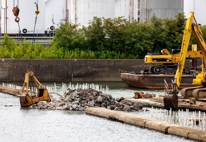 Contractors for the U.S. Army Corps of Engineers Pittsburgh District use various floating barges to drill, demolish and remove the fixed-crest dam at the Monongahela River Locks and Dam 3 in Elizabeth, Pennsylvania, July 29, 2024.