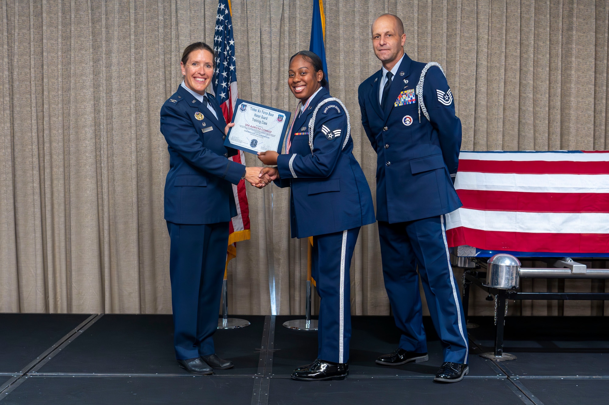 woman receives award