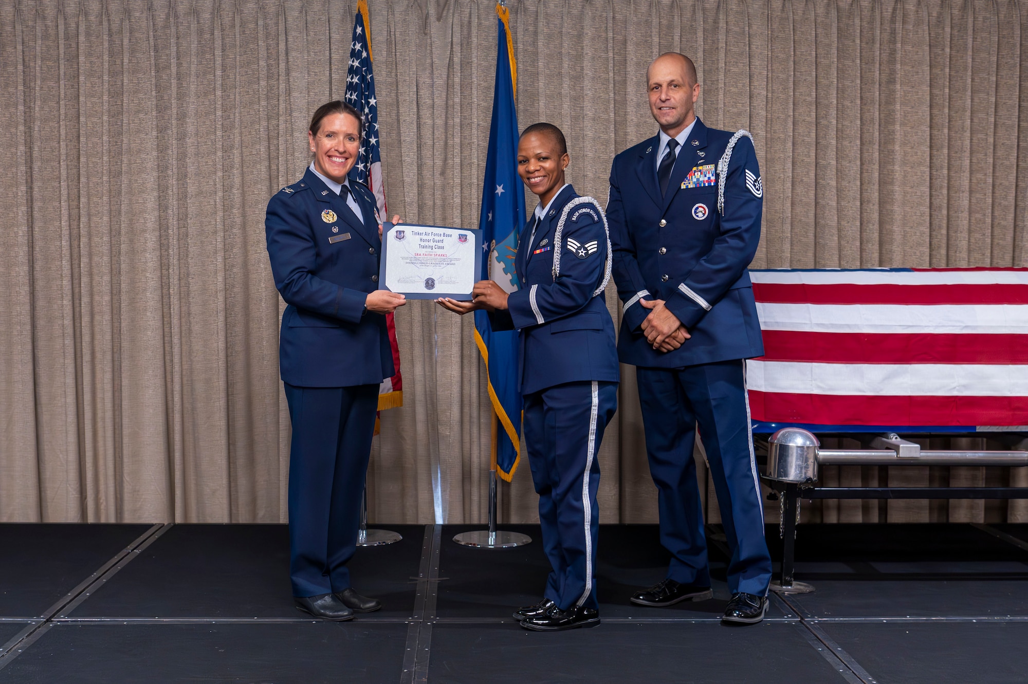 woman receives award