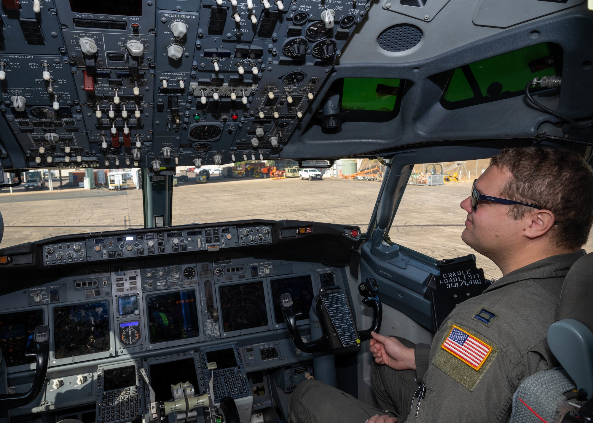 Photo of a U.S. Air Force pilot conducting preflight checks