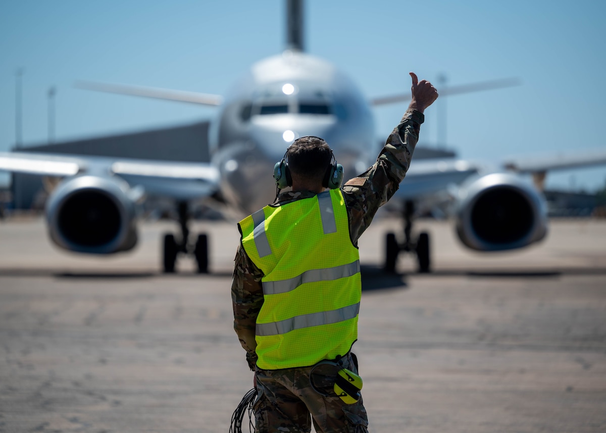Photo of a U.S. Airman performing flight line duties