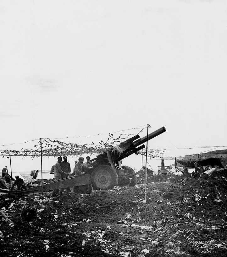 Army 155mm howitzer on Tinian, providing fire support during the assault.  28 July 1944.  Much of the combat service support for the Tinian operation was provided by the Army.