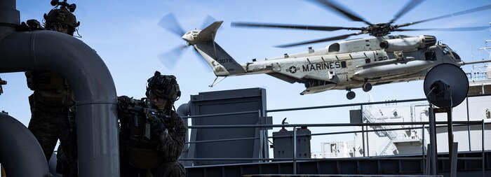 U.S. Marines with the maritime raid force, 31st Marine Expeditionary Unit, set up security during a visit, board, search, and seizure training aboard USS Miguel Keith (ESB 5), in the Philippine Sea, on July 30, 2024.