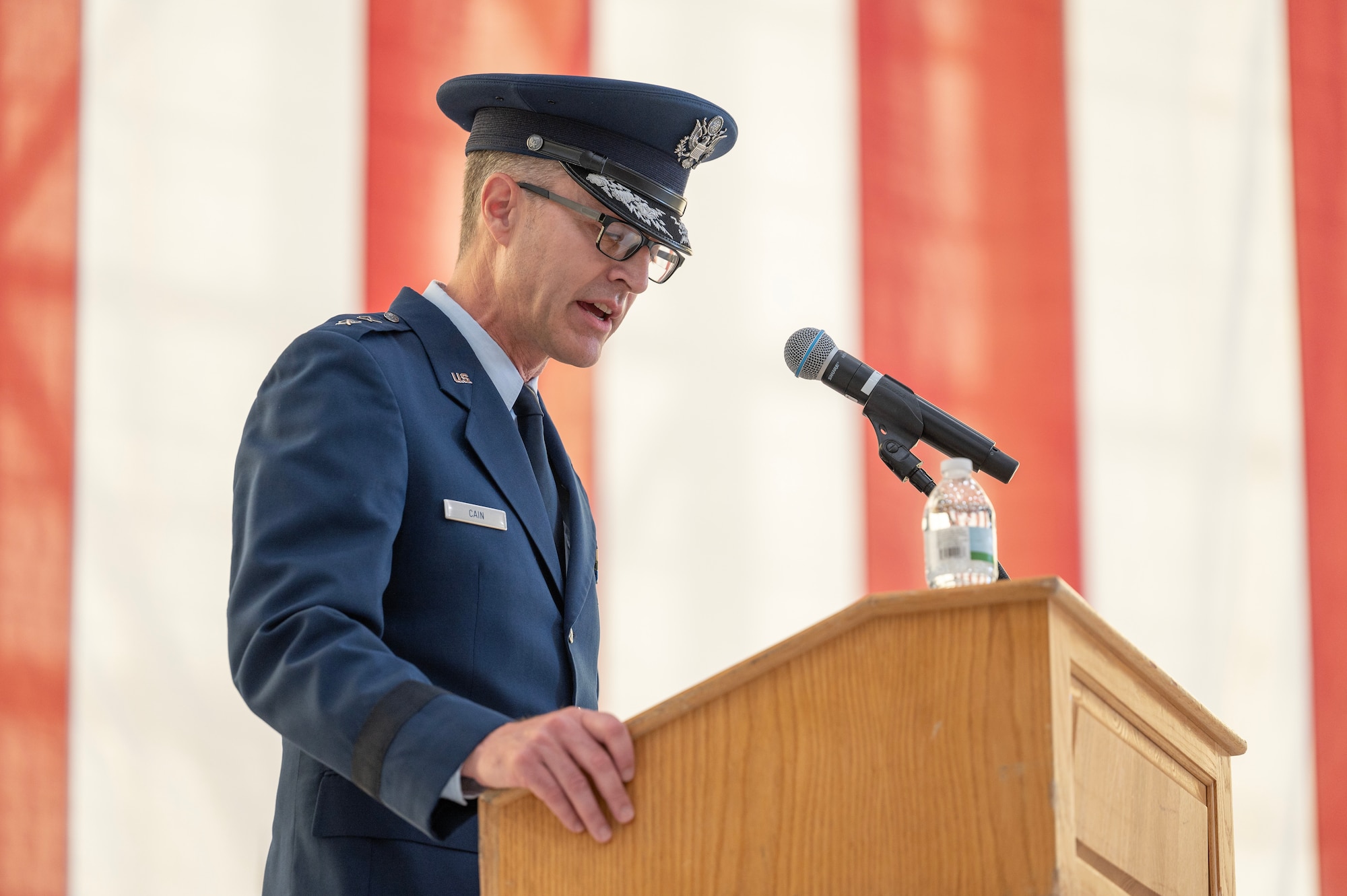 Maj. Gen. Scott Cain speaks at podium