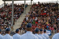 More than 700 Airmen assigned to Flights 472-487, receive their Airman’s coin during the 737th Training Group’s Coin and Retreat Ceremony, at Joint Base San Antonio-Lackland, Texas, July 24, 2024. The ceremony is one of three U.S. Air Force Basic Military Training graduation events and signifies the transition from trainee to Airman. Lt. Col. Rodolfo Orozco, 321st Training Squadron commander, and Chief Master Sergeant Valeria Andrade, 321 TRS Senior Enlisted Leader, were the guest speakers for the ceremony. The 37th Training Wing, known as “Gateway to the Air Force” is home to BMT. (U.S. Air Force photo by Ava Leone)
