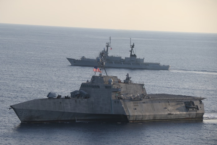 SOUTH CHINA SEA (July 31, 2024) – Independence-class littoral combat ship USS Mobile (LCS 26) conducts a Maritime Cooperative Activity with Philippine Navy’s Gregorio del Pilar-class patrol ship, BRP Ramon Alcaraz (PS 16), in the South China Sea, July 31, 2024. Mobile, part of Destroyer Squadron 7, is on a rotational deployment operating in the U.S. 7th Fleet area of operations to enhance interoperability with allies and partners and serve as a ready-response force in support of a free and open Indo-Pacific region. (U.S. Navy photo by Naval Aircrewman Tactical Helicopter 2nd Class Diego Chavez)