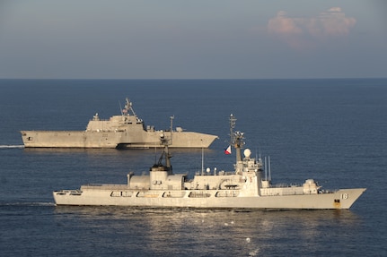 SOUTH CHINA SEA (July 31, 2024) – Independence-class littoral combat ship USS Mobile (LCS 26) conducts a Maritime Cooperative Activity with Philippine Navy’s Gregorio del Pilar-class patrol ship, BRP Ramon Alcaraz (PS 16), in the South China Sea, July 31, 2024. Mobile, part of Destroyer Squadron 7, is on a rotational deployment operating in the U.S. 7th Fleet area of operations to enhance interoperability with allies and partners and serve as a ready-response force in support of a free and open Indo-Pacific region. (U.S. Navy photo by Naval Aircrewman Tactical Helicopter 2nd Class Diego Chavez)
