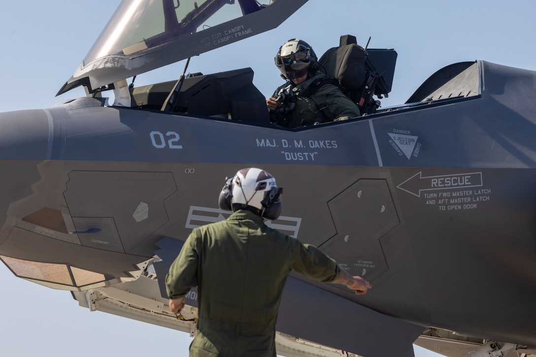 U.S. Marine Corps Cpl. Larry Casas, a fixed-wing aircraft mechanic with Marine Fighter Attack Squadron (VMFA) 311, Marine Aircraft Group 11, 3rd Marine Aircraft Wing, directs a U.S. Marine Corps F-35C Lightning II aircraft during a live ordnance training event at the Marine Corps Air Station Miramar combat aircraft loading area, California, July 25, 2024. This was the first time VMFA-311 conducted live ordnance operations independently and a milestone for the squadron, which declared initial operational capability on July 31, 2024. Achieving initial operational capability means that VMFA-311 has the operational F-35C aircraft, trained pilots, maintainers, and support equipment to self-sustain its mission essential tasks. (U.S. Marine Corps photo by Lance Cpl. Jennifer Sanchez)