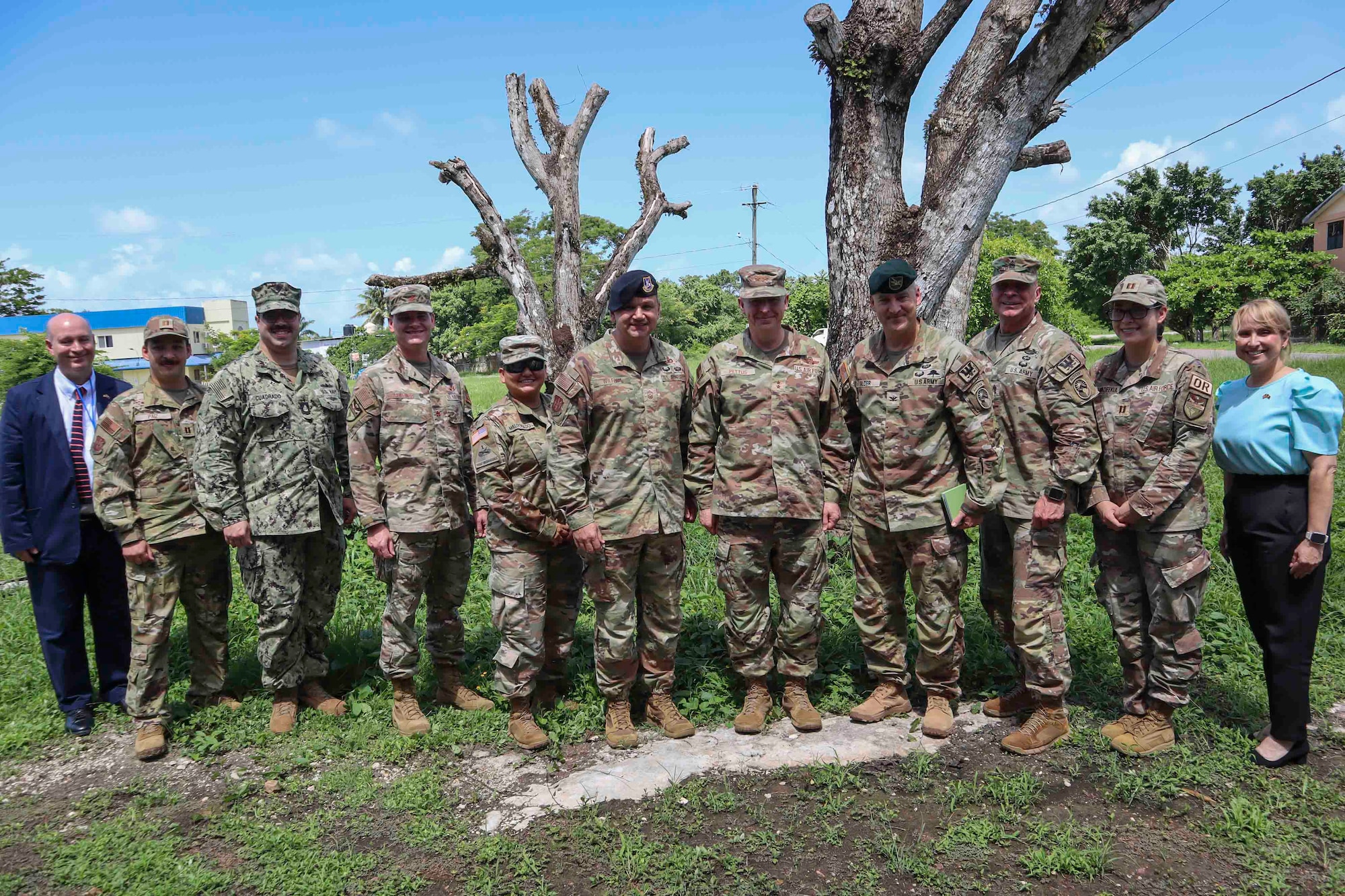A photo of people smiling for a picture.