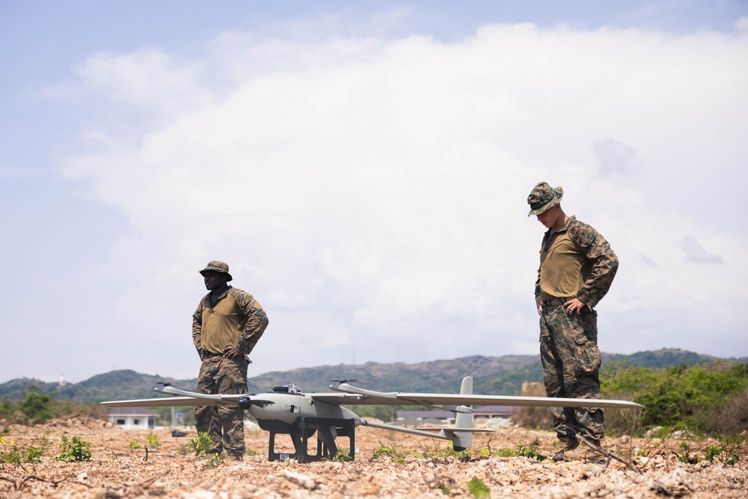 U.S. Marines with 3rd Marine Littoral Regiment, 3rd Marine Division, conduct pre-flight checks on the Stalker VXE30 unmanned aerial system during the Littoral Zone Reconnaissance Cobra exercise for Archipelagic Coastal Defense Continuum at Camp Cape Bojeador, Philippines, May 20, 2024. LZR Cobra is a bilateral command post exercise between U.S. Marines with 3rd MLR and Philippine Marines with the Coastal Defense Regiment and 4th Marine Brigade aimed at enhancing interoperability, refining tactics, techniques, and procedures, and supporting combined and joint force maritime domain awareness. ACDC is a series of bilateral exchanges and training opportunities between U.S. Marines and Philippine Marines aimed at bolstering the Philippine Marine Corps’ Coastal Defense strategy while supporting the modernization efforts of the Armed Forces of the Philippines. (U.S. Marine Corps photo by Cpl. Eric Huynh)