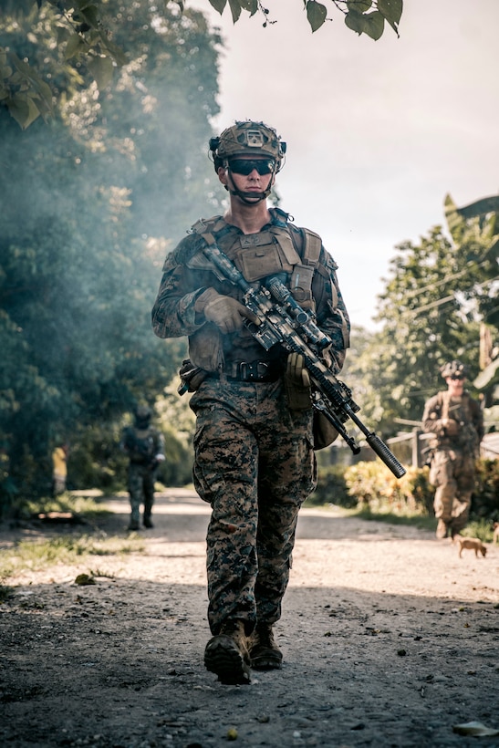U.S. Marine Corps Lance Cpl. Jonah Hendrickson, a rifleman assigned to Alpha Company, Battalion Landing Team 1/5, 15th Marine Expeditionary Unit, and native of Tennessee, patrols with U.S. Marines and Philippine Marines assigned to Marine Battalion Landing Team 3 during Archipelagic Costal Defense Continuum at San Vicente, Palawan, Philippines, May 21, 2024. ACDC is a series of bilateral exchanges and training opportunities between U.S. Marines and Philippine Marines aimed at bolstering the Philippine Marine Corps’ Coastal Defense strategy while supporting modernization efforts of the Armed Forces of the Philippines. (U.S. Marine Corps photo by Cpl. Joseph Helms)