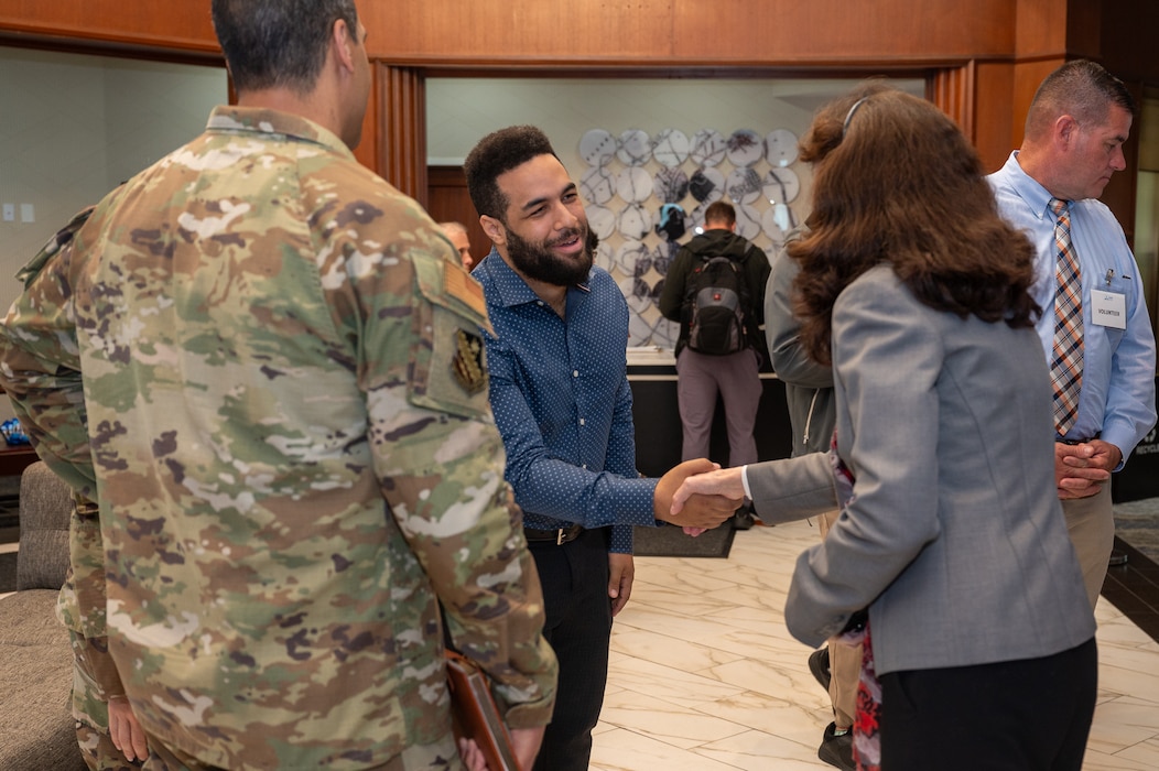 Image of people shaking hands