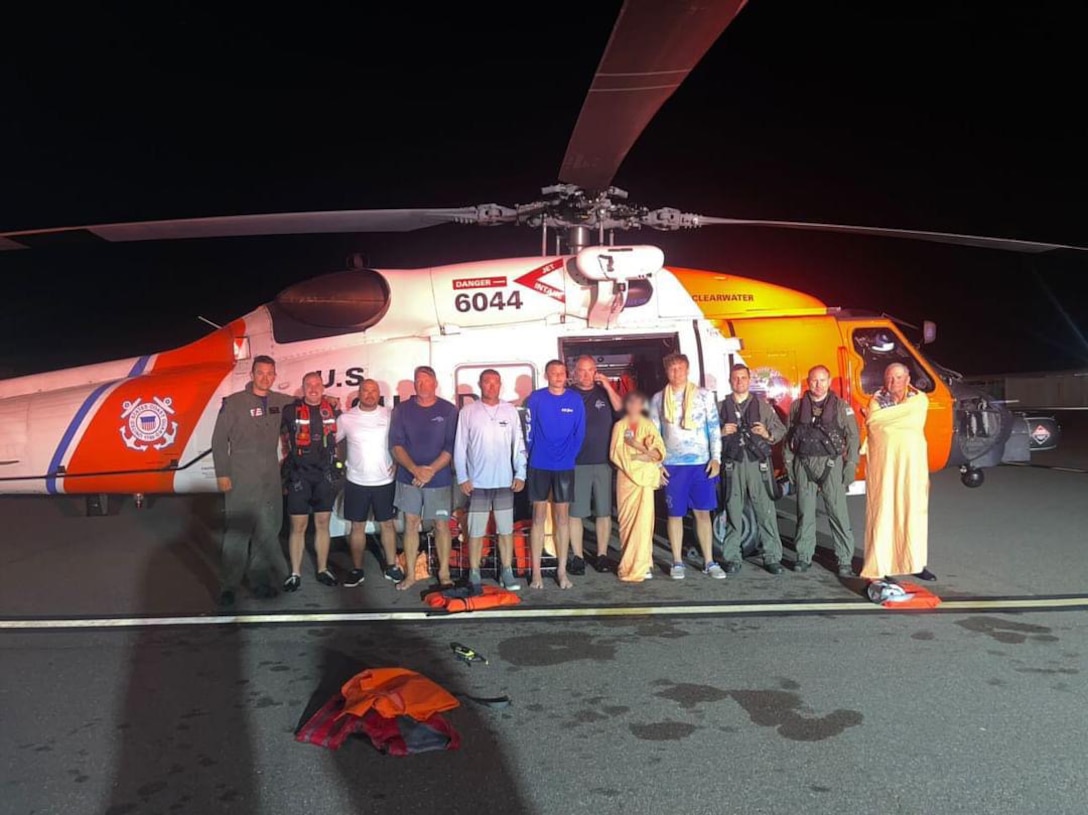 A Coast Guard Air Station Clearwater aircrew rescues 1 child and 7 adults after their 28-foot boat capsized 36 miles west of Boca Grande, Florida, June 1, 2024. The aircrew hoisted each individual from the water and transported them to emergency medical services at Venice Municipal Airport. (U.S. Coast Guard photo)