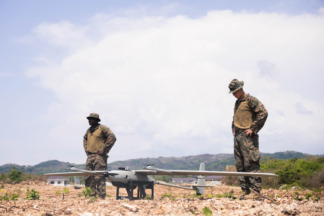 U.S. Marines with 3rd Marine Littoral Regiment, 3rd Marine Division, conduct pre-flight checks on the Stalker VXE30 unmanned aerial system during the Littoral Zone Reconnaissance Cobra exercise for Archipelagic Coastal Defense Continuum at Camp Cape Bojeador, Philippines, May 20, 2024. LZR Cobra is a bilateral command post exercise between U.S. Marines with 3rd MLR and Philippine Marines with the Coastal Defense Regiment and 4th Marine Brigade aimed at enhancing interoperability, refining tactics, techniques, and procedures, and supporting combined and joint force maritime domain awareness. ACDC is a series of bilateral exchanges and training opportunities between U.S. Marines and Philippine Marines aimed at bolstering the Philippine Marine Corps’ Coastal Defense strategy while supporting the modernization efforts of the Armed Forces of the Philippines. (U.S. Marine Corps photo by Cpl. Eric Huynh)