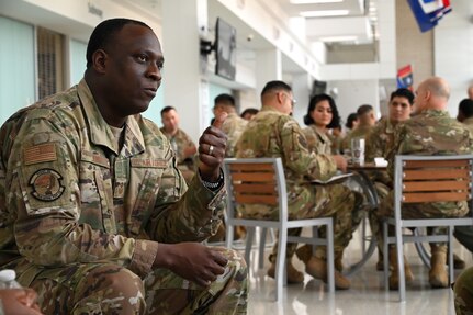 Photo of Senior Master Sgt. Jevon King, 74th Aerial Port Squadron first sergeant, describing the importance of self-care as a first sergeant during a speed mentoring event at Wilford Hall Ambulatory Surgical Center on Joint Base San Antonio-Lackland, Texas.