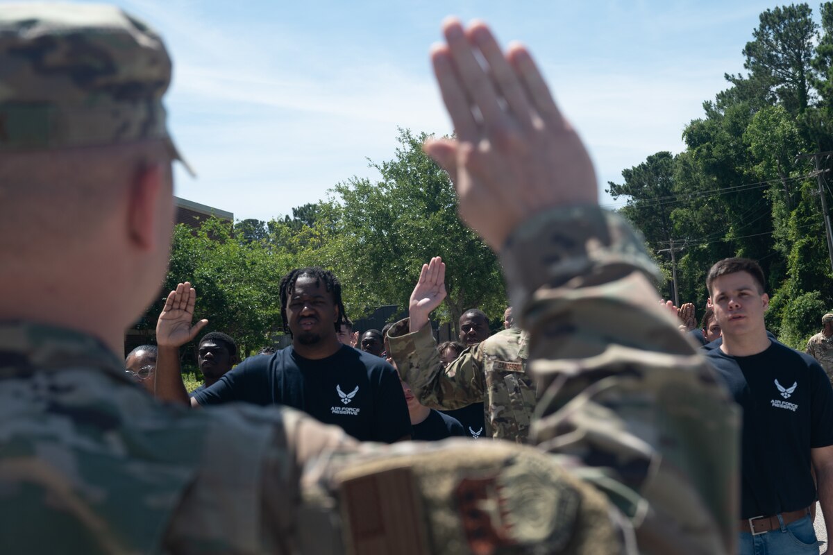 The 315th Airlift Wing Development and Training Flight held a ceremony in which 45 trainees gave their commitment to honor the Oath of Enlistment, two took the Oath, and one member reenlisted, June 1, 2024, at Joint Base Charleston, South Carolina. (U.S. Air Force photo by Tech. Sgt. Della Creech)