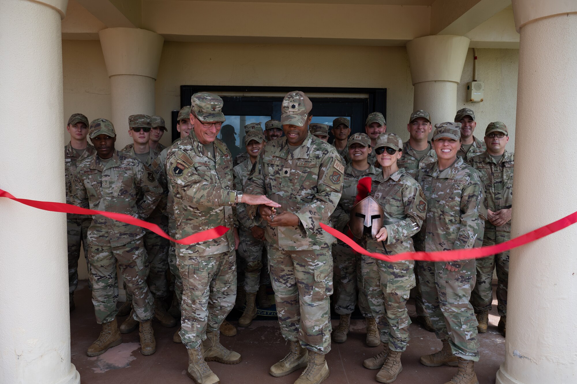 U.S. Air Force Lt. Col. Edwin Pratt, 36th Operations Support Squadron commander, addresses the 36th OSS squadron after the ribbon cutting of there restored offices at Andersen Air Force Base, Guam, May. 29, 2024. It has almost been a year since the OSS had to find refuge in other offices since the severe damage caused by Typhoon Mawar. The squadron has now returned to their home next to the Andersen passenger terminal, which is being repaired as well. (U.S. Air Force photo by Airman 1st Class Manasseh Demissie)