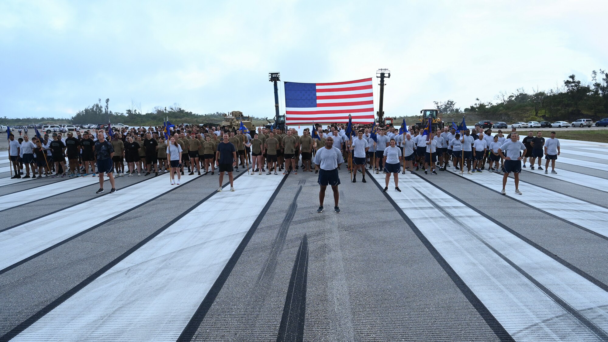 36th Wing Airmen pose for a picture after a 5K Run for Memorial Day at the Pacific Regional Training Center-Andersen, Guam, May 24, 2024. This run was held in honor for all the service members who have fallen in the line of duty. (U.S. Air Force photo by Senior Airman Akeem Campbell)