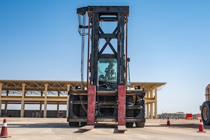 A U.S. Air Force vehicle operator assigned to the 378th Expeditionary Logistics Readiness Squadron parks a forklift during a logistics rodeo challenge with the Royal Saudi Air Force at an undisclosed location within the U.S. Central Command area of responsibility, June 2, 2024. Providing opportunities to train and work with our partners maximizes our collective strengths and builds trust. (U.S. Air Force photo)