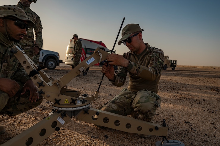 The 378th Expeditionary Communications Squadron assembles a communication fly-away kit during tactical airfield integration training