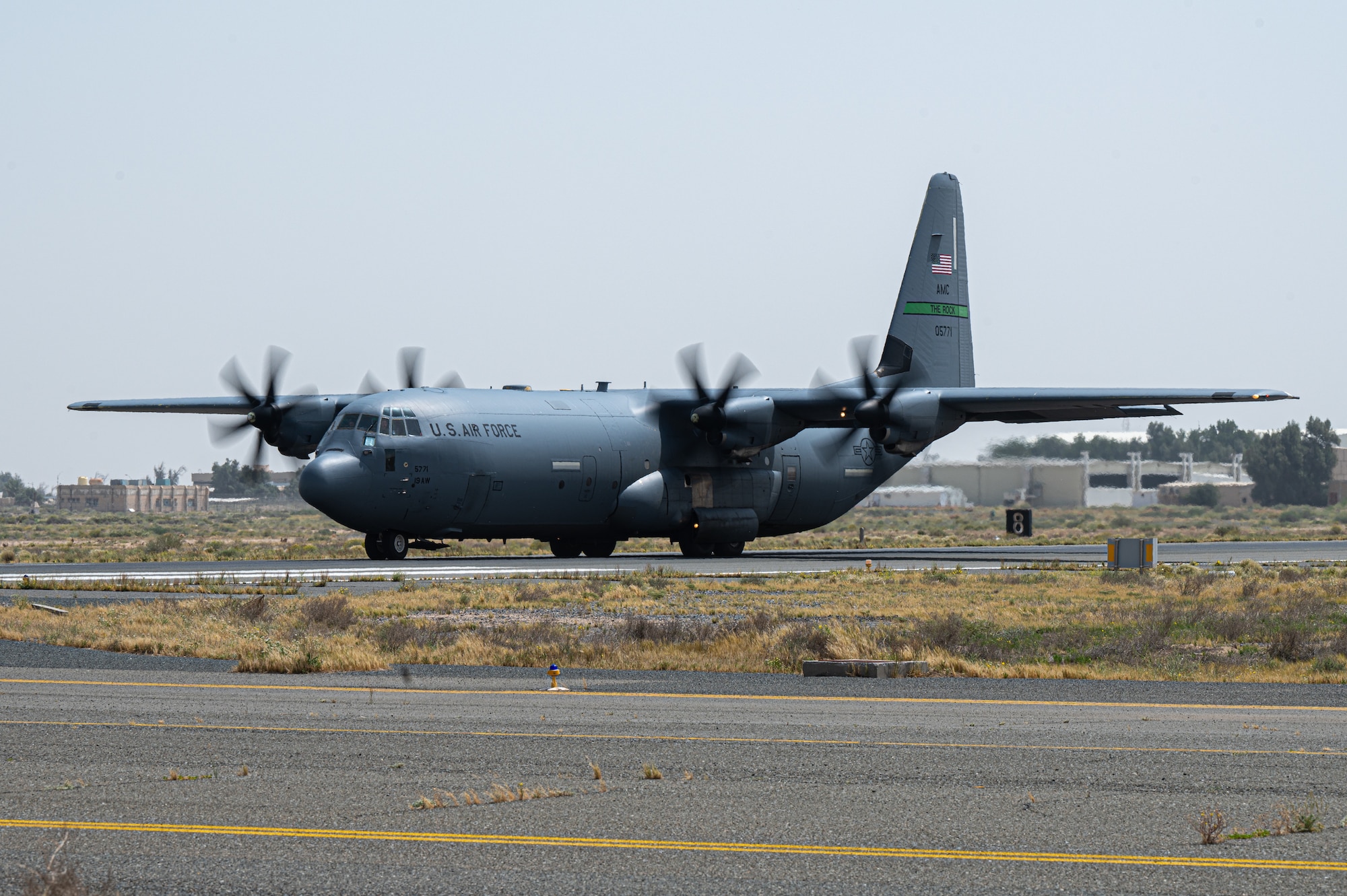 A U.S. Air Force C-130J Super Hercules loaded with pallets of food destined for Gaza via airdrop taxis at an undisclosed location within the U.S. Central Command area of responsibility, April 9, 2024. The U.S. Air Force’s rapid global mobility capability enabled the expedited movement of critical, life-saving humanitarian aid to Gaza. (U.S. Air Force photo)