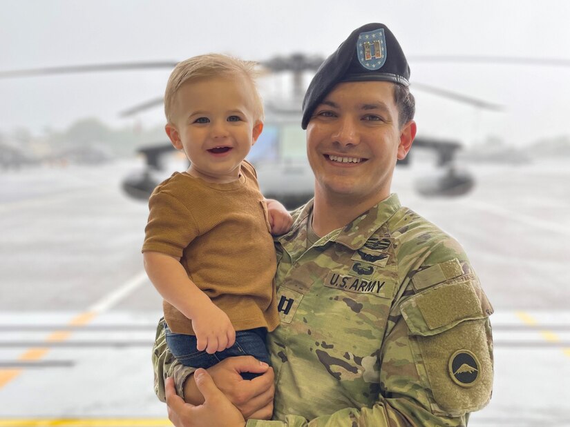 Capt. Nate Degen with his son Lincoln at his change of command ceremony at Camp Zama Japan in 2023.