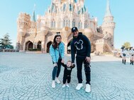 Katlyn, Lincoln, and Nate Degen at Disney in Tokyo.