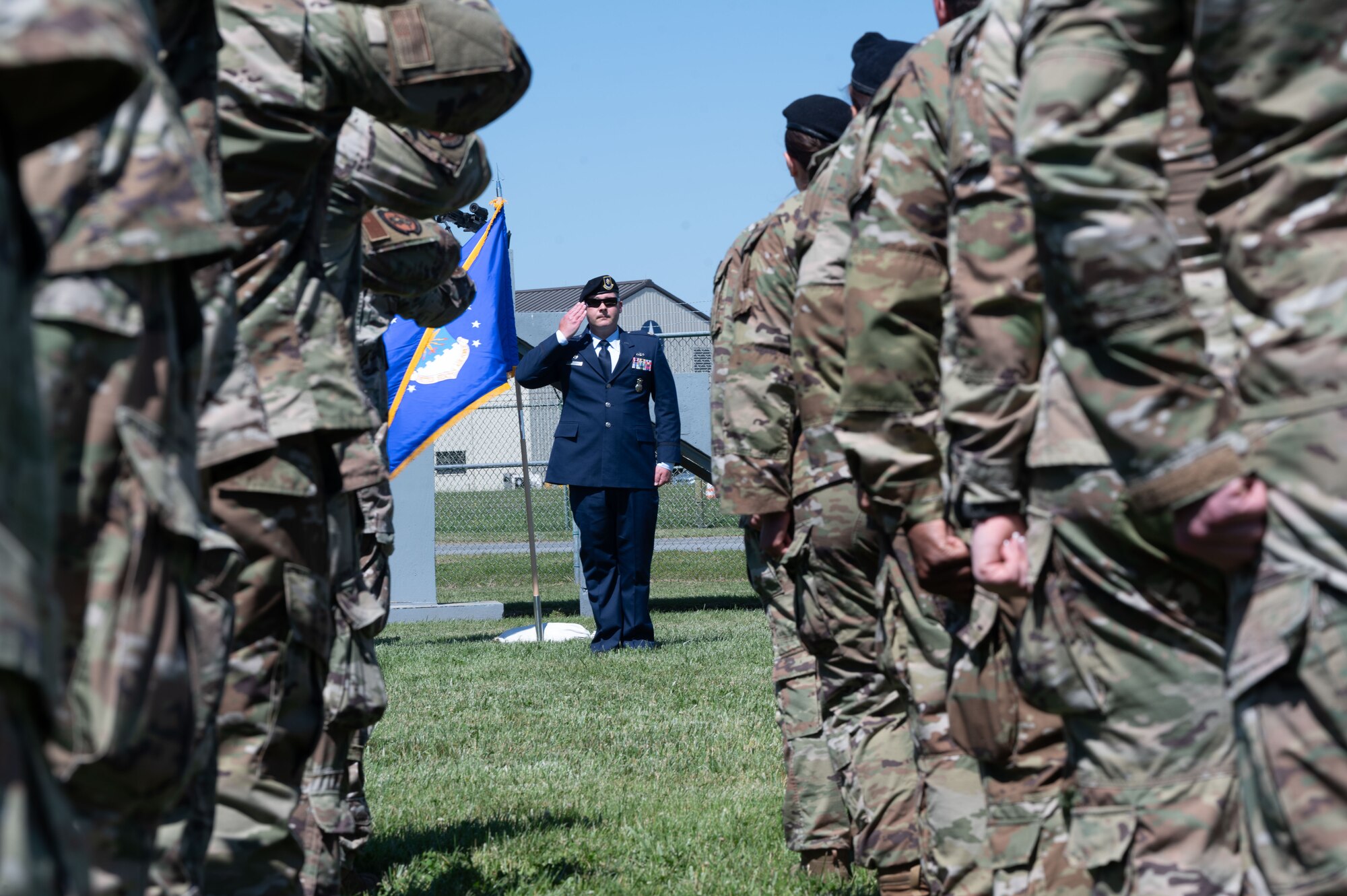 Airmen from the 436th Security Forces Squadron give Maj. Daniel C. Parsons, 436th Security Forces Squadron commander, his first salute as squadron commander during a change of command ceremony at Dover Air Force Base, Delaware, May 31, 2024. The ceremony saw Lt. Col. David S. Ratté relinquish command to Parsons. (U.S. Air Force photo by Senior Airman Dieondiere Jefferies)