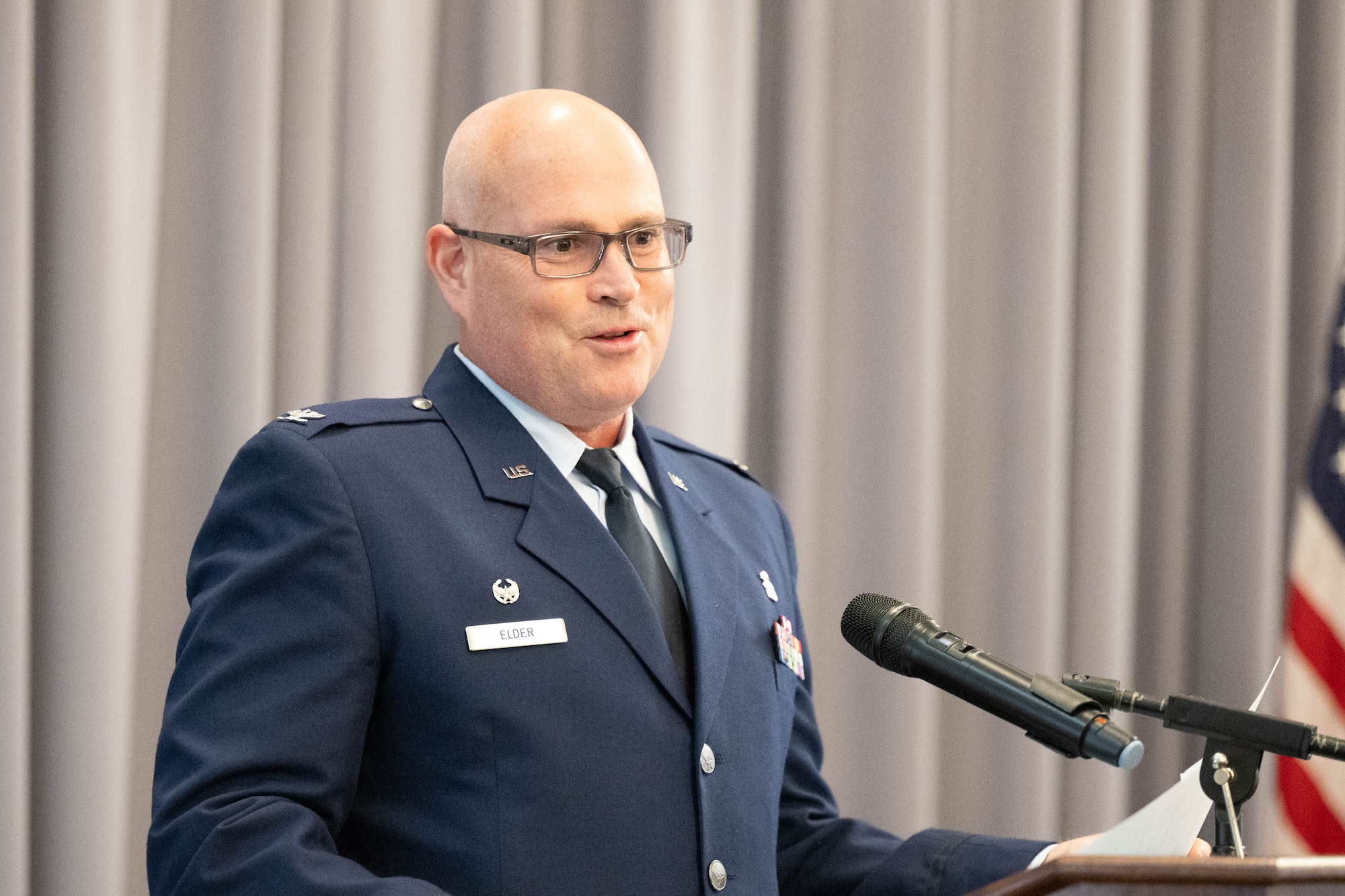 U.S. Air Force Col. Jamison Elder gives his first address as the 436th Medical Group commander, during a change of command ceremony at Dover Air Force Base, Delaware, May 30, 2024. The ceremony saw Col. Peggy Dickson relinquish command to Elder. (U.S. Air Force photo by Mauricio Campino)