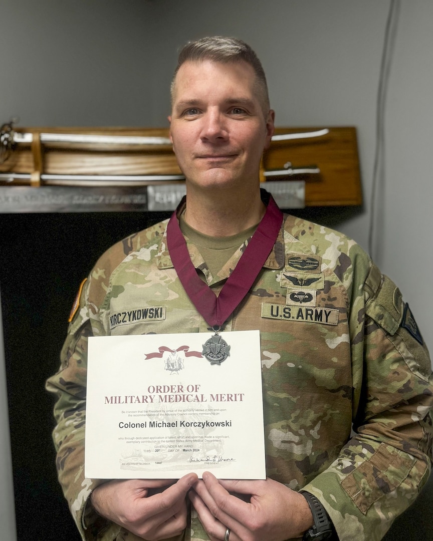 U.S. Army Col. Michael Korczykowski, Commander, Vermont Medical Detachment, Vermont National Guard, poses with his Order of Military Medical Merit medal and award.