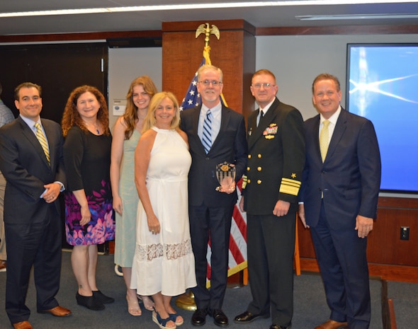 Strategic Systems Programs (SSP) awarded the recipients of the 2023 SSP Director’s Awards and 2023 Fleet Ballistic Missile (FBM) Lifetime Achievement Awards at the biannual Steering Task Group Meeting, 22 May. Vice Adm. Johnny Wolfe, Jr. director Strategic Systems Programs (second from right), presented Mr. Dennis Boyé, Lockheed Martin – Rotary & Mission Systems (third from right), with the FBM Lifetime Achievement Award. The FBM Lifetime Achievement Award recognizes SSP’s industry partners who demonstrate an unparalleled degree of professionalism and excellence. To date, 113 people have received the award, including this year’s recipients. The FBM Lifetime Achievement Award is sponsored by SSP Historical, Educational and Recognition Organization (HERO), an all-volunteer 501(c) (3) Non-Profit Organization which works to promote awareness and appreciation of the partnership between government and private industry in the development and maintenance of the Navy’s FBM program. (U.S. Navy photo by Joseph Ross/Released)