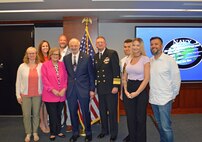 Vice Adm. Johnny Wolfe Jr., director Strategic Systems Programs (fourth from right), presented Mr. Mike Coussa, EMCUBE (fifth from right), with a 50-year FBM Service Award at the biannual Steering Task Group Meeting, 22 May. Fifty-year FBM Service Awards celebrate the career-long achievements and commitments of industry and government personnel who have support the FBM program for over 50 years. (U.S. Navy photo by Joseph Ross/Released)