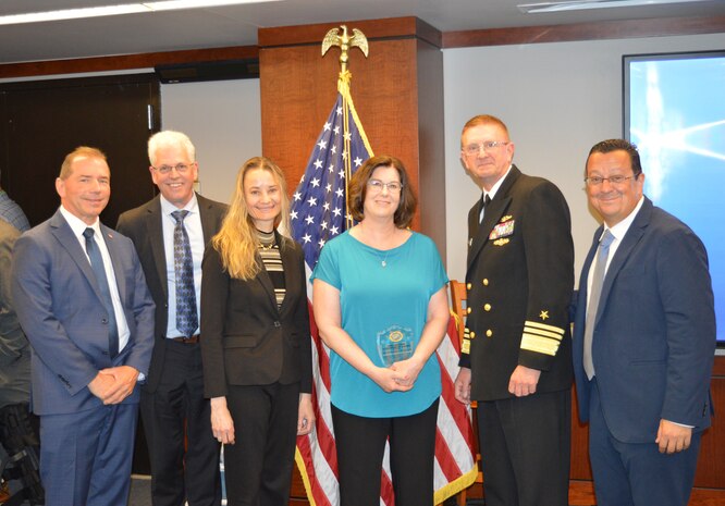 Strategic Systems Programs (SSP) awarded the recipients of the 2023 SSP Director’s Awards and 2023 Fleet Ballistic Missile (FBM) Lifetime Achievement Awards at the biannual Steering Task Group Meeting, 22 May. Vice Adm. Johnny Wolfe Jr., director Strategic Systems Programs (second from right), presented Ms. Annemarie Fitzgerald, General Dynamics – Mission Systems (third from right), with the FBM Lifetime Achievement Award. The FBM Lifetime Achievement Award recognizes SSP’s industry partners who demonstrate an unparalleled degree of professionalism and excellence. To date, 113 people have received the award, including this year’s recipients. The FBM Lifetime Achievement Award is sponsored by SSP Historical, Educational and Recognition Organization (HERO), an all-volunteer 501(c) (3) Non-Profit Organization which works to promote awareness and appreciation of the partnership between government and private industry in the development and maintenance of the Navy’s FBM program. (U.S. Navy photo by Joseph Ross/Released)