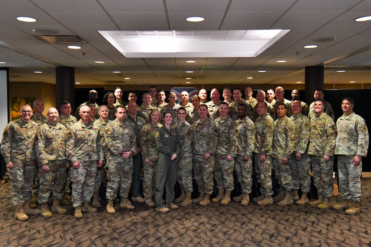 Participants of the Triad Summit pose for a photograph at Youngstown Air Reserve Station, Ohio, May 29, 2024.