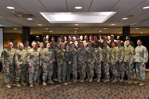 Participants of the Triad Summit pose for a photograph at Youngstown Air Reserve Station, Ohio, May 29, 2024.