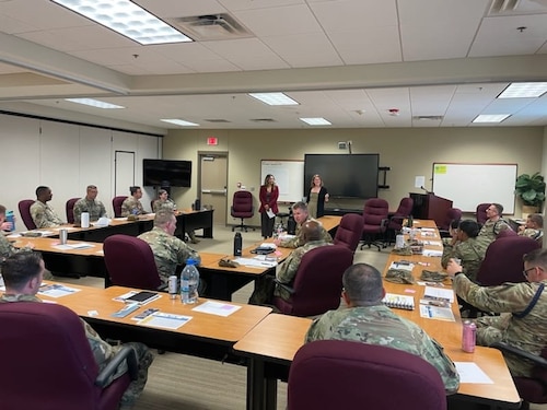 Emily Rivera Velasquez, 17th Training Wing Integrated Resilience Office integrated prevention coordinator, and Annaka Drouin, IRO prevention specialist, provide training during the First Sergeant Symposium at Goodfellow Air Force Base, Texas. The IRO’s mission is focused on primary prevention, aiming to address issues before they manifest. (Courtesy Photo)