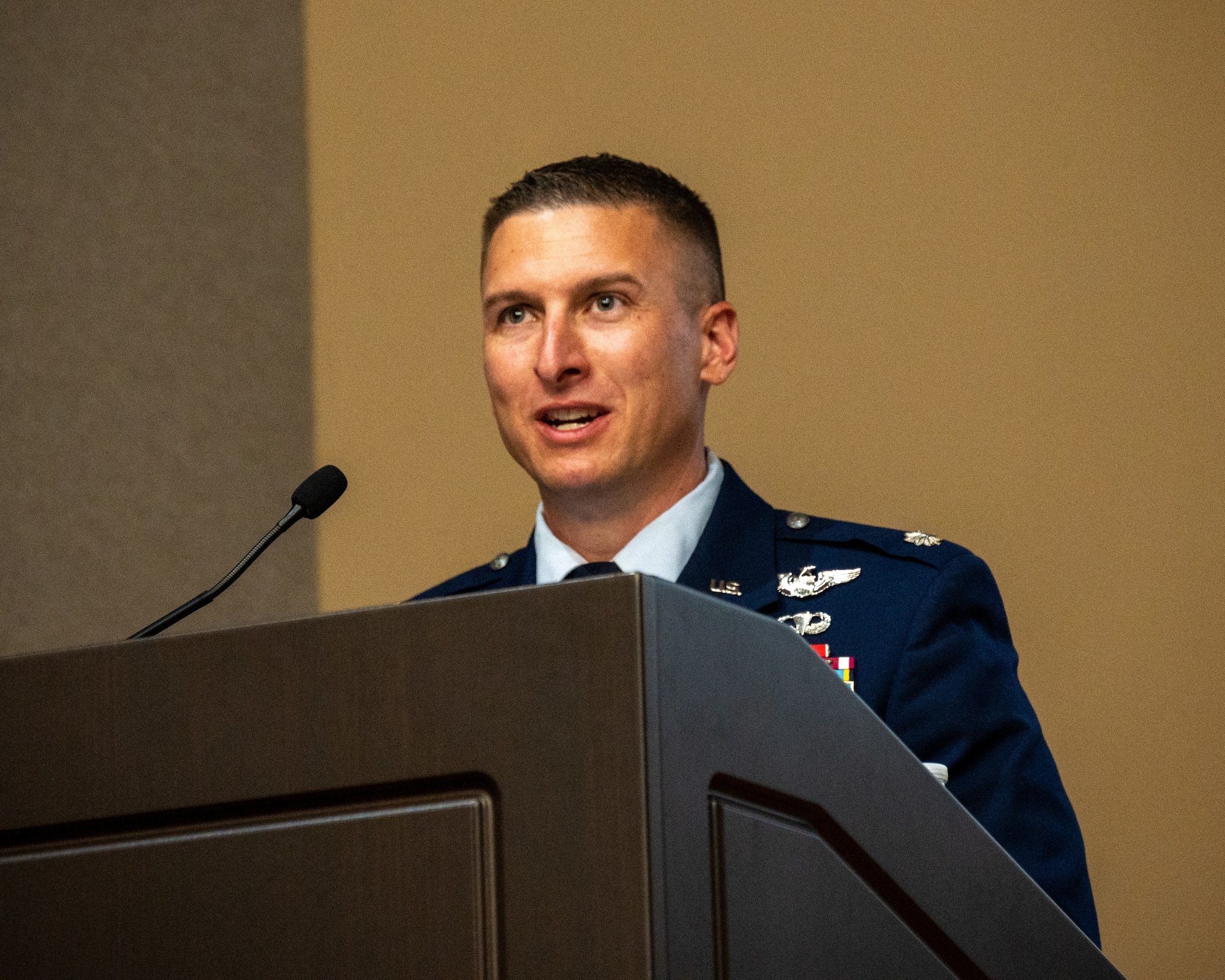 U.S. Air Force Lt. Col. Daniel Garrison, new 47th Operations Support Squadron (OSS) commander, gives a speech at the 47th OSS change of command ceremony at Laughlin Air Force Base, Texas, May 29, 2024. As commander, Garrison will oversee 10 Airfield sites and three radar facilities worth over 1.5 million dollars. (U.S. Air Force photo by Staff Sgt. Nicholas Larsen)