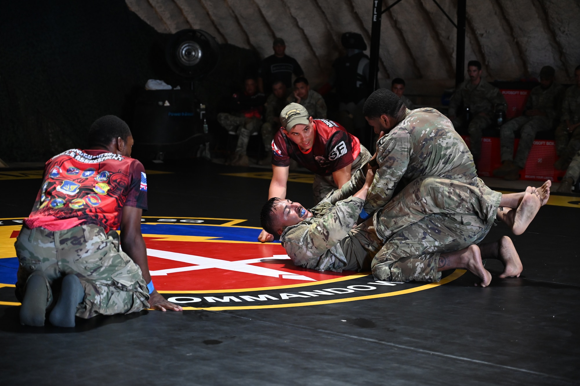 U.S Air Force Senior Airman Dorrean Starks, assigned to the 374th Security Forces Squadron, and Senior Airman Roman Garay, assigned to the 673rd SFS, compete in the championship round of combatives at the Pacific Regional Training Center-Andersen, Guam, May 21, 2024. The combatives competition was one of four events in the 7th Annual Advanced Combat Skills Assessment Competition hosted by 736th SFS. (U.S. Air Force photo by Airman 1st Class Natasha Ninete)