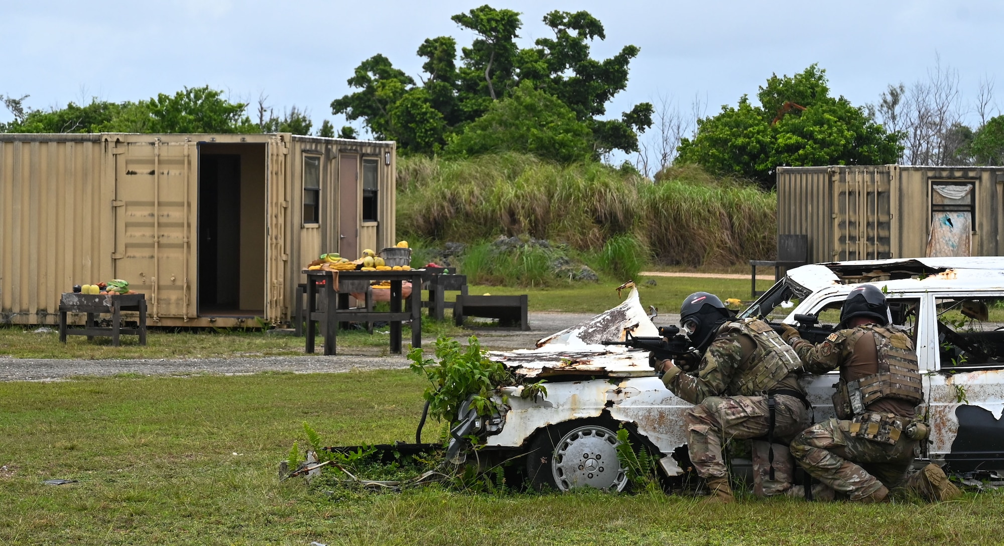 U.S. Air Force service members attached to the 51st Security Forces Squadron, Osan Air Base, South Korea, engage in a tactical assault simulation at the Pacific Regional Training Center-Andersen, Guam, May 23, 2024. Fifteen teams across the Pacific Air Forces competed against each other during a week-long Advanced Combat Fitness Assessment Competition hosted by the 736th SFS. (U.S. Air Force photo by Airman 1st Class Natasha Ninete)