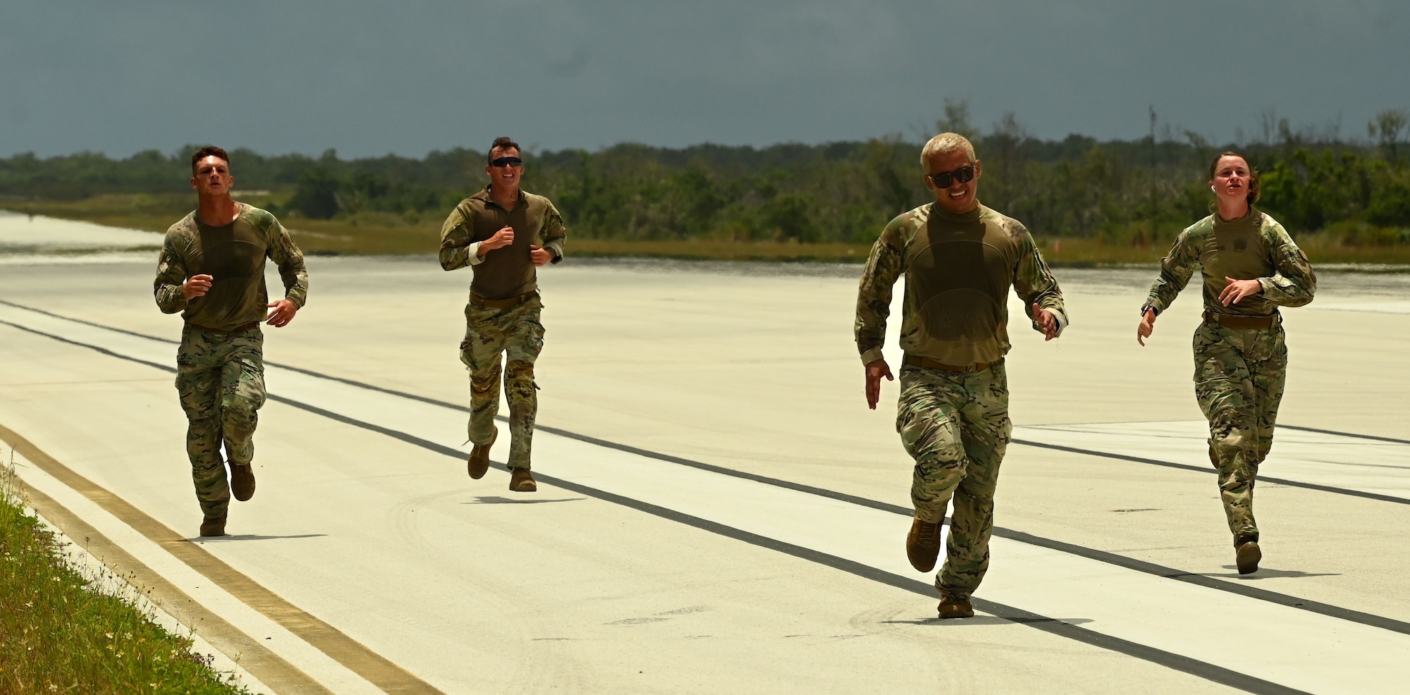 36th Security Forces Squadron Airmen complete the 1.5 mile run portion of the Combat Fitness Test at the Pacific Regional Training Center-Andersen, Guam, May 20, 2024. The 36th SFS was one of 15 teams competing in the 7th Annual Advanced Combat Skills Assessment Competition hosted by the 736th SFS. (U.S. Air Force photo by Airman 1st Class Natasha Ninete)