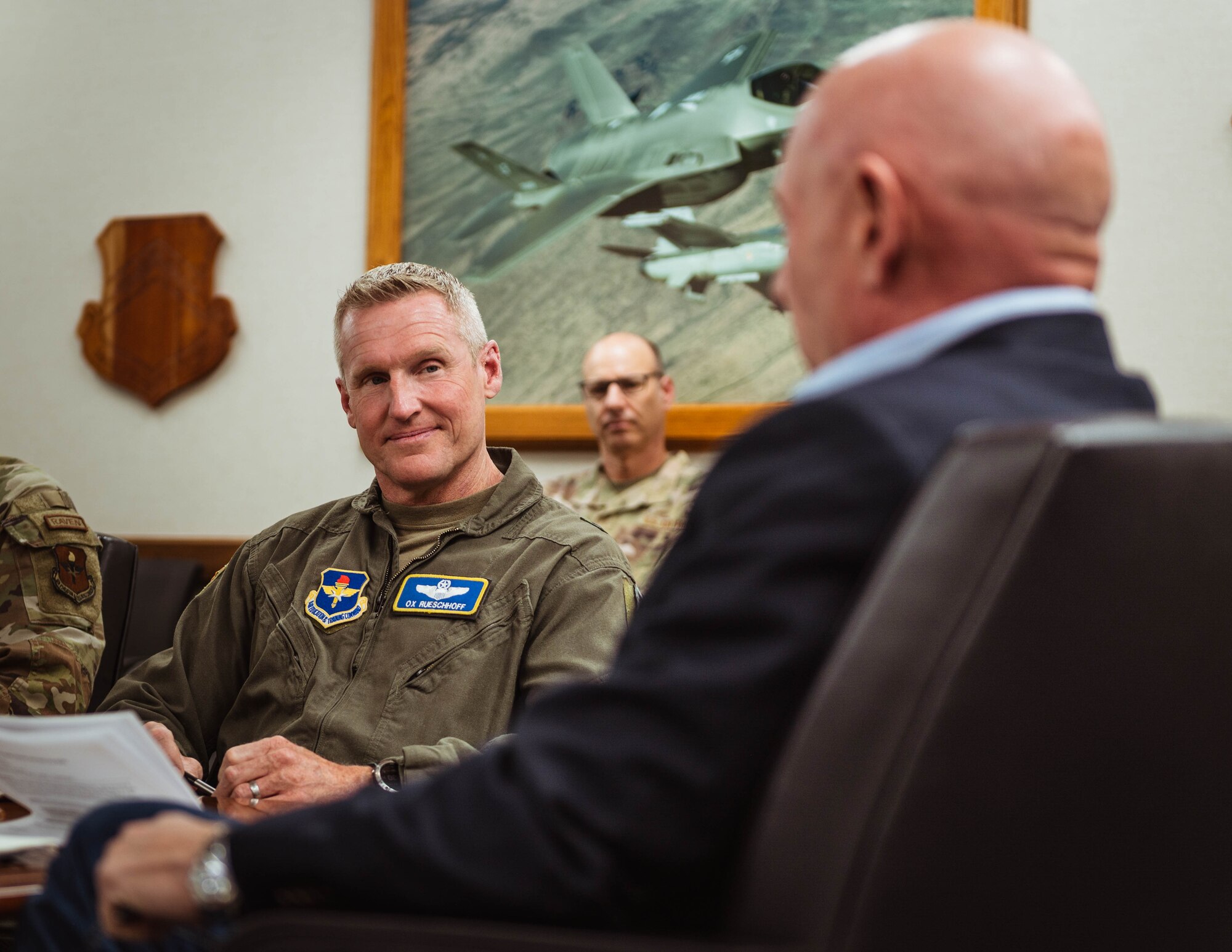 U.S. Air Force Brig. Gen. Jason M. Rueschhoff, 56th Fighter Wing commander, looks to U.S. Senator Mark Kelly during a brief.