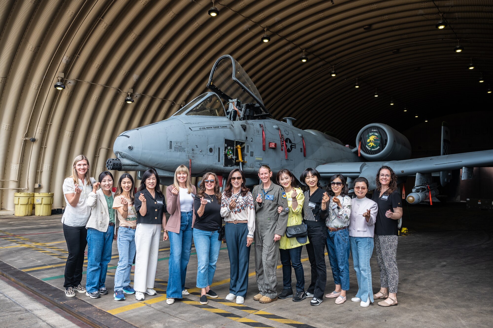 U.S. Air Force and Republic of Korea Air Force spouses, pose for a group photo at Osan Air Base, Republic of Korea, May 30, 2024. Military dependents are a direct link to establishing and building unit resilience and a sense of community at military installations. (U.S. Air Force photo by Staff Sgt. Christopher Tam)