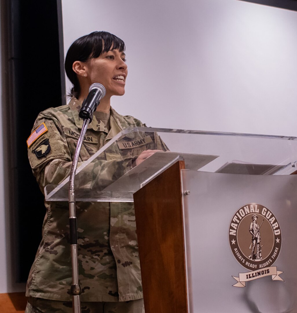 Newly promoted Maj. Tarah McClain, Executive Officer, Recruiting and Retention Battalion, Illinois Army National Guard, thanks her family, friends, and fellow Soldiers for their support throughout her career during a promotion ceremony May 31 at the Illinois Military Academy, Camp Lincoln, Springfield.