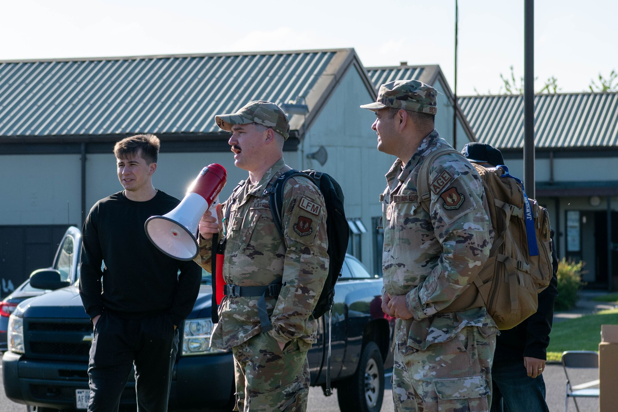 Airmen give a safety brief before a Norwegian Foot March