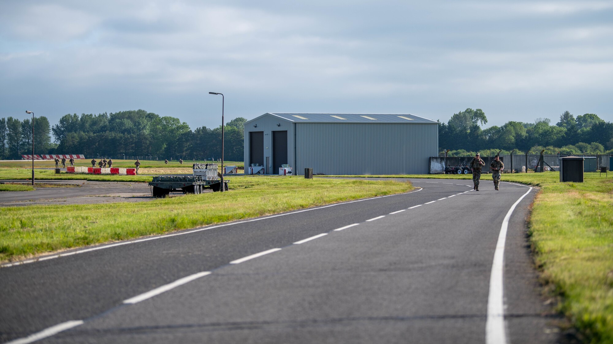 Competitors advance along the base perimeter during a Norwegian Foot March