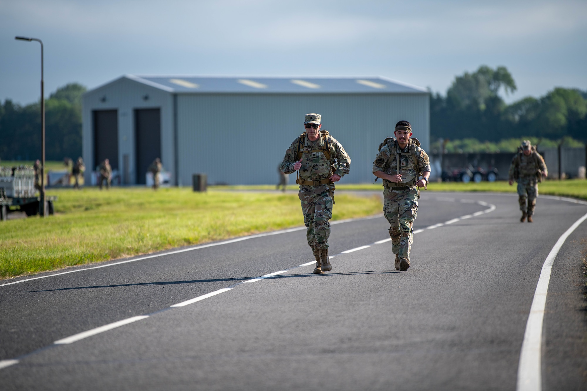 Competitors advance along the base perimeter during a Norwegian Foot March