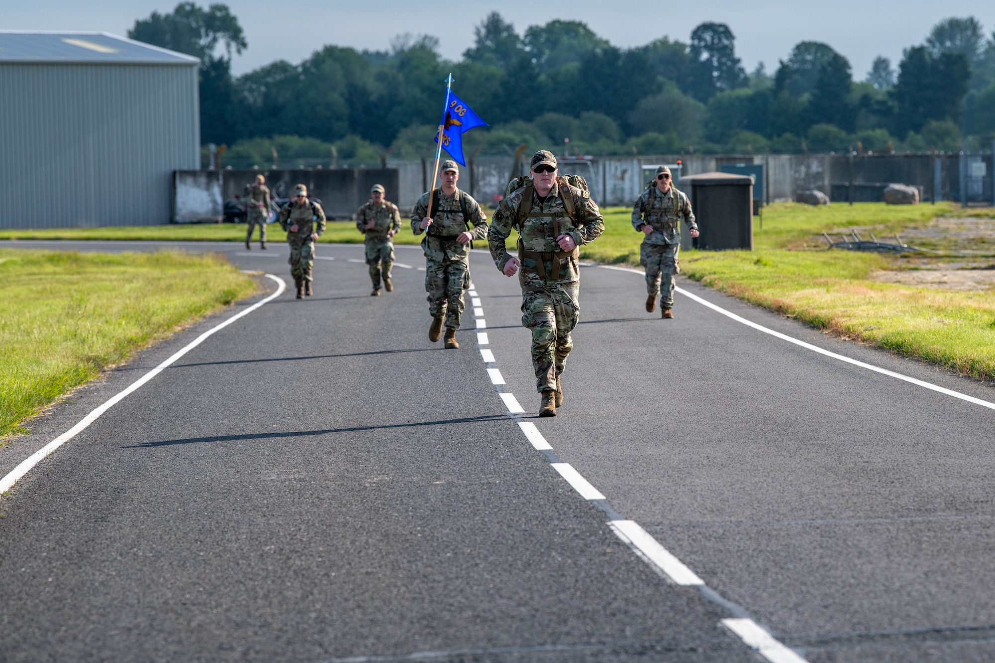 Competitors advance along the base perimeter during a Norwegian Foot March