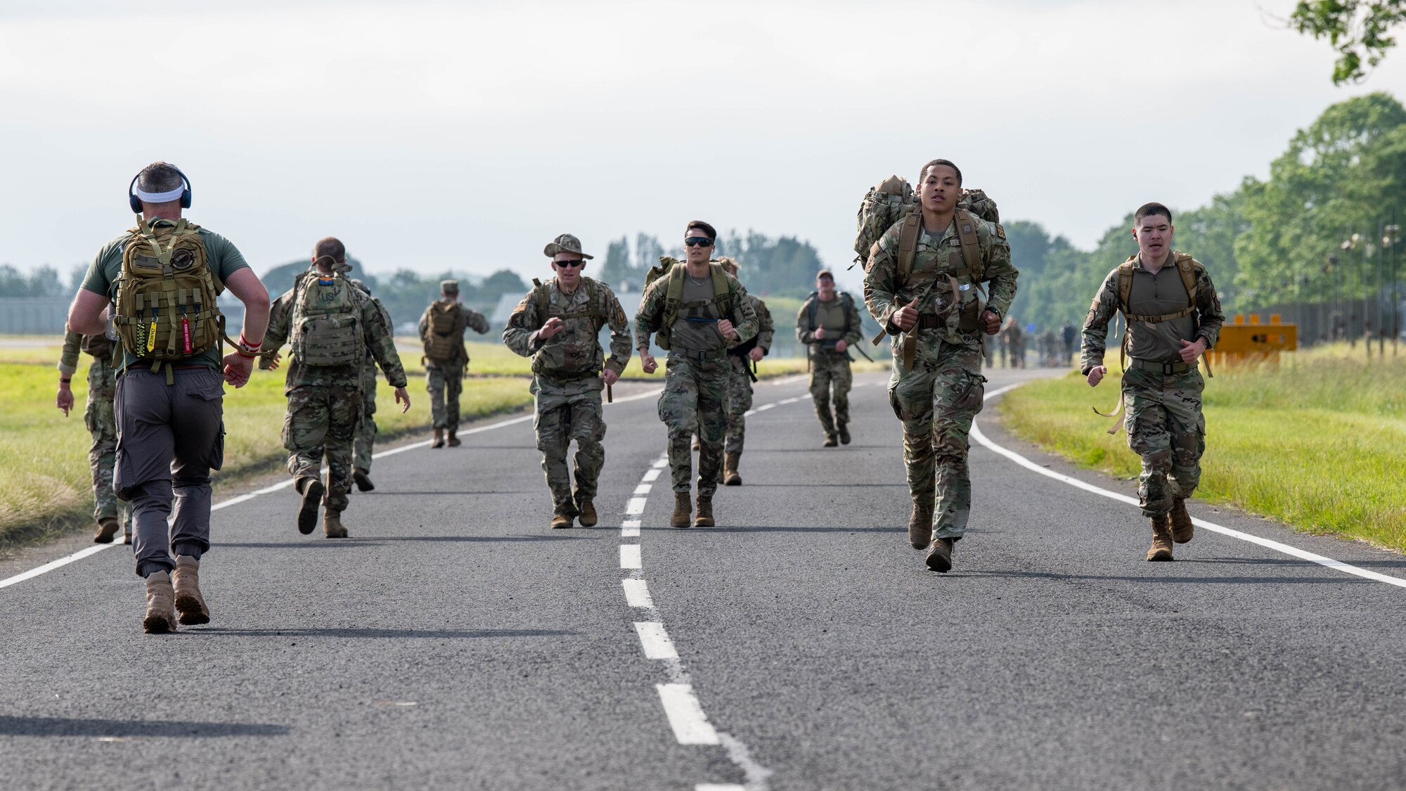 Competitors advance along the base perimeter during a Norwegian Foot March