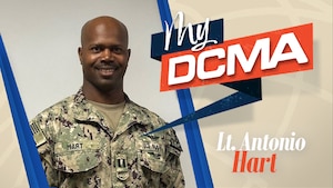 Smiling man wears a Navy camouflage uniform